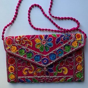 Hand-embroidered clutch handbag